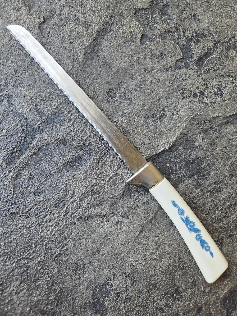 Cornflower Blue Lifetime Cutlery Serrated Table Knife with White Floral Handle